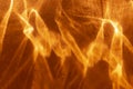 Abstract dark orange fire like background with shadows and sparkles. Royalty Free Stock Photo