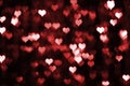 Abstract dark valentine background with red hearts