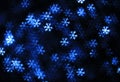 Abstract dark winter background with navy blue and white snowflakes Royalty Free Stock Photo