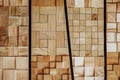 Abstract decorative ecological unpainted wooden background with geomethrical mosaik close-up, natural texture.