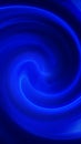 Abstract deep blue swirl of glowing energy lines creating a smooth flowing vortex Royalty Free Stock Photo