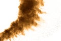 Abstract deep brown dust explosion on white background.