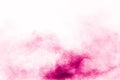 Abstract deep pink powder explosion on white background. Freeze motion of deep pink powder splash Royalty Free Stock Photo