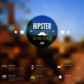 Abstract defocused, blurred landscape background with hipster sign. Vintage label with retro icons.