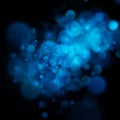 Abstract defocused circular blue bokeh on dark background. EPS 10 Royalty Free Stock Photo