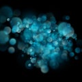 Abstract defocused circular blue bokeh on dark background. EPS 10 Royalty Free Stock Photo