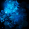 Abstract defocused circular blue bokeh on dark background. EPS 10 Royalty Free Stock Photo