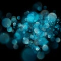 Abstract defocused circular blue bokeh on dark background. EPS 10 Royalty Free Stock Photo