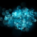 Abstract defocused circular blue bokeh on dark background. EPS 10 Royalty Free Stock Photo