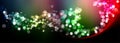 Abstract defocused circular multicolored luxury red green glitter bokeh lights background. Magic background.Holiday background. Royalty Free Stock Photo