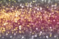 Abstract defocused gold, pink and grey bokeh background