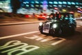 Abstract defocused in motion British Taxi hackney carriage cab d Royalty Free Stock Photo
