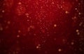 Abstract, defocused red, gold glittering christmas background
