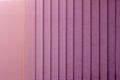 Abstract design background of vertical blinds in shades of pink