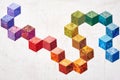 Abstract design of colorful pieces fabrics that look like cubes