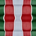 abstract design with cuts of fabric in green, white and red color, background and texture