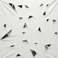 Abstract design featuring a white surface with triangular cuts. The cuts create a Royalty Free Stock Photo