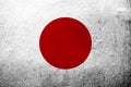 National flag of Japan `Nisshoki Hinomaru`. Grunge background