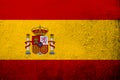 Kingdom of Spain National flag `la Rojigualda`with the coat of arms of Spain. Grunge background