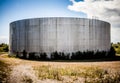 Detail of a big abandoned oil refinery gas tank Royalty Free Stock Photo