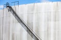 Abstract detail of a high and long stair case of an oil refinery Royalty Free Stock Photo