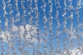 Abstract detail of water falling from a fountain against a blue sky Royalty Free Stock Photo