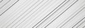Abstract diagonal lines pattern on wall creating geometric background Royalty Free Stock Photo