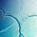 Abstract digital art depicting blue and white ripples on a water surface. The image features Royalty Free Stock Photo