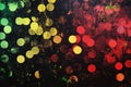 An abstract digital background of scattered luminous dots in red, green, and yellow over a dark, ai