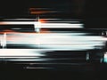 Abstract digital glitch art with vibrant horizontal lines and light effects on dark background Royalty Free Stock Photo