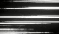 Abstract digital glitch effect with horizontal lines and data corruption on black background Royalty Free Stock Photo