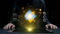 Abstract digital interface with geometric shapes and glowing elements displayed on tablet by a person in a suit in a Royalty Free Stock Photo