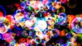 Abstract dimension rainbow bubbles with dancing hearts floating on dark screen Royalty Free Stock Photo