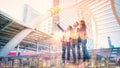 Abstract double exposure image of businessteam pointing up the future on blurred city background. Business success concept Royalty Free Stock Photo