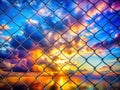 Abstract Double Exposure Overhead View of a Chain Link Fence with a Geometric Sky Pattern Capturing Ironwork Texture Royalty Free Stock Photo