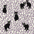 Abstract draw of little black kittens on the leopard pattern