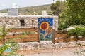 Abstract drawing on the wall of a stone house made by a local artist in the famous artists village Ein Hod near Haifa in northern