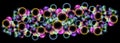 Abstract dynamic background with 3D colorful circles. Black wide banner with liquid colored bubble shapes.