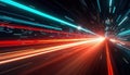 Abstract dynamic view of city at night. High speed motion blurs lights into streaks of color. Data streams, info appear as