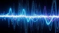 Abstract visualization of sound waves with glowing blue and purple light patterns Royalty Free Stock Photo