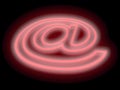 Abstract E-mail symbol in neon light Royalty Free Stock Photo