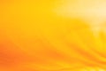 Abstract empty graphic background of orange yellow and gold color with a gradient from lighting effect with copy space for text.