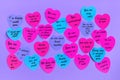 Abstract empty sticky note in the shape of a heart magnet on pink board. Royalty Free Stock Photo