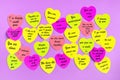 Abstract empty sticky note in the shape of a heart magnet on pink board Royalty Free Stock Photo