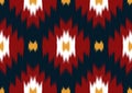 abstract ethnic ikat seamless pattern, geometric shape red and yellow on blue background, design templates for wallpaper, clothing Royalty Free Stock Photo