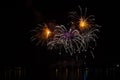 Abstract explosion in rich fireworks over surface of Brno`s Dam with lake reflection Royalty Free Stock Photo