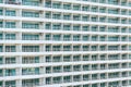 Abstract exterior building architecture and balcony with window pattern Royalty Free Stock Photo