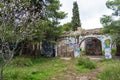 Abstract face wall painting at an abandoned old villa at Pallini, Greece