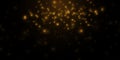 Abstract falling golden lights. Magic gold dust and highlights. Festive Christmas background.