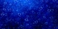 Abstract falling hearts in navy blue cloudy design